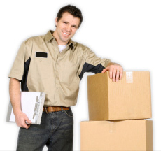 A courier worker in Arizona standing next to boxes
